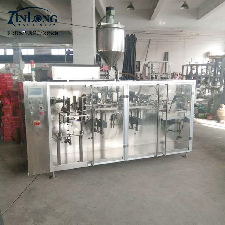 直銷(xiāo)給袋式包裝機(jī)水平式全自動(dòng)包裝機(jī)休閑食品包裝機(jī)水平給袋機(jī)