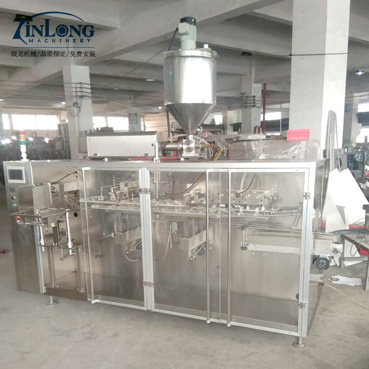 直銷(xiāo)給袋式全自動(dòng)包裝機(jī)水平式包裝機(jī)休閑食品包裝機(jī)水平給袋機(jī)